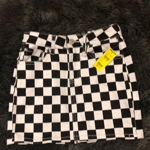 Tilly’s checkered skirt